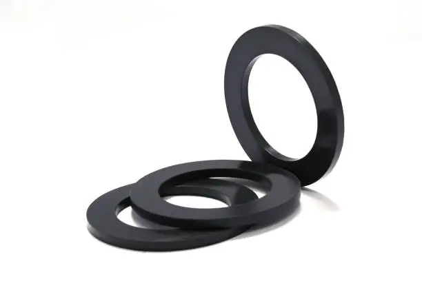 Pile of rubber gaskets and washers isolated on white. High quality photo.