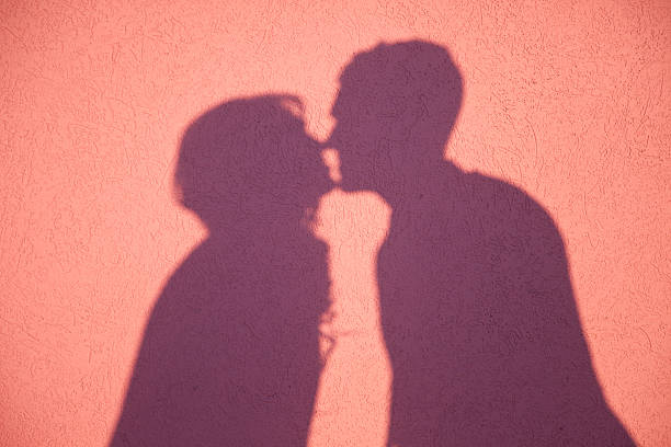 istock Shadow of a young couple kissing 139561441