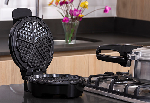 Modern electric waffle maker - Kitchen background