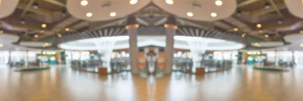 istock Abstract blur modern shopping mall interior background 1395629909
