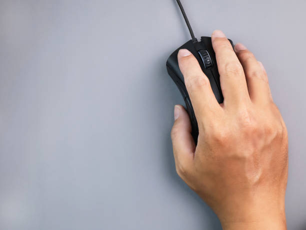 istock hand grip mouse black with usb cable Work or shop online Use your finger to press the switch on the left and right. On the four gray workspace, left copy space. 1395631592