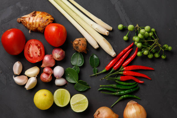 istock Thai kitchen. Various herbs, spices  and Ingredients on dark background. Top view with copy space 1395632585