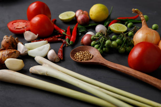 istock Thai kitchen. Various herbs, spices  and Ingredients on dark background. Top view with copy space 1395632599