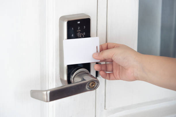istock closeup people using contactless ID card scan door locker security system opening the door 1395632918