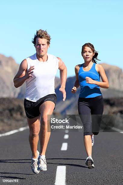 Running Couple Stock Photo - Download Image Now - Couple - Relationship, Exercising, Marathon