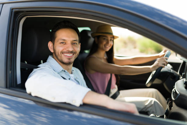 istock Cheerful couple taking a long road trip 1395642827