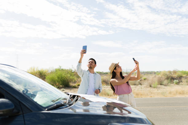 Lost couple with no reception on their phones stock photo