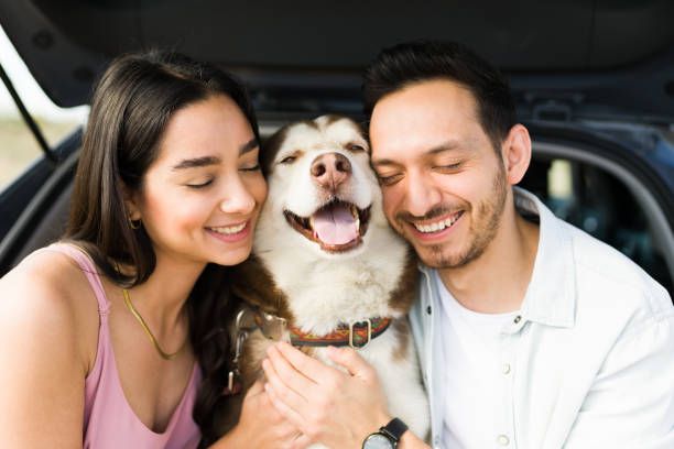 Adorable dog lover latin couple