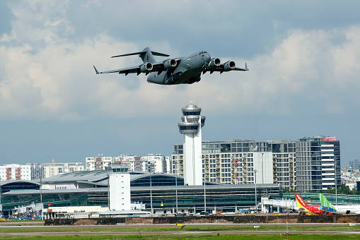 Ho Chi Minh city, Vietnam – May 01st 2022: Boeing C-17A Globemaster III of Royal Australian Air Force with registration A41-209 was departing Tan Son Nhat international airport, Ho Chi Minh city heading for Queenland, Australia after taking the Vietnamese peace keepers in South Sudan home.