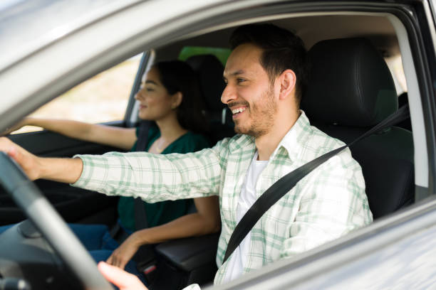 istock Excited couple going on a weekend trip in the car 1395644309