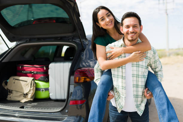 istock Fun couple going on a long road trip 1395644320