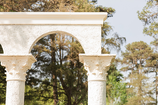 Italian-Inspired Cream-Colored Columns Outdoors in Nature in Tennessee in the Spring of 2022