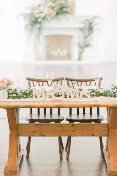 istock Mr. & Mrs. Sweetheart Table at a Chic Neutral, Romantic Rustic Modern Style Wedding Reception Decor at a Spring Wedding in Tennessee 1395650020