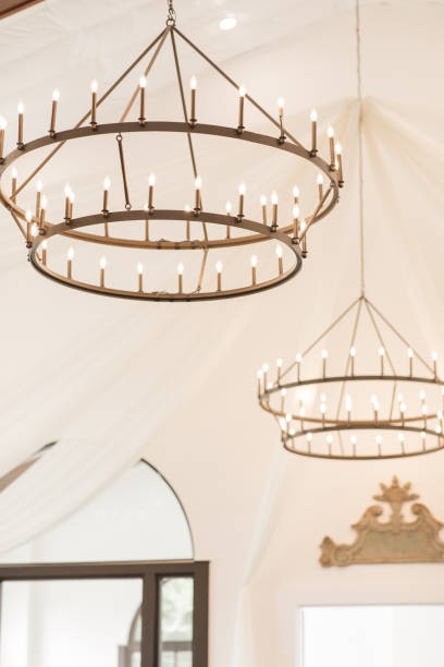 Modern Black Chandeliers in a White Room at a Chic Neutral, Romantic Rustic Modern Style Wedding Reception Decor at a Spring Wedding in Tennessee.