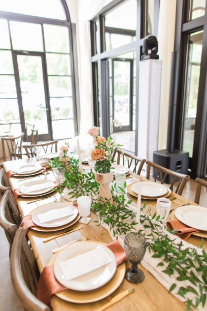 istock Place-settings & Wedding Decor on a Dining Table at a Chic Neutral, Romantic Rustic Modern Style Wedding Reception Decor at a Spring Wedding in Tennessee 1395650237