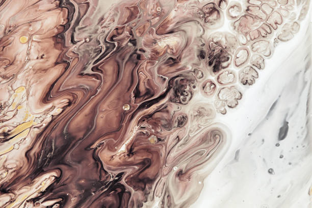 istock Fluid Art acrylic paints. Abstract mixing brown, black and white waves. Liquid flows splashes. Marble effect background or texture 1395651174