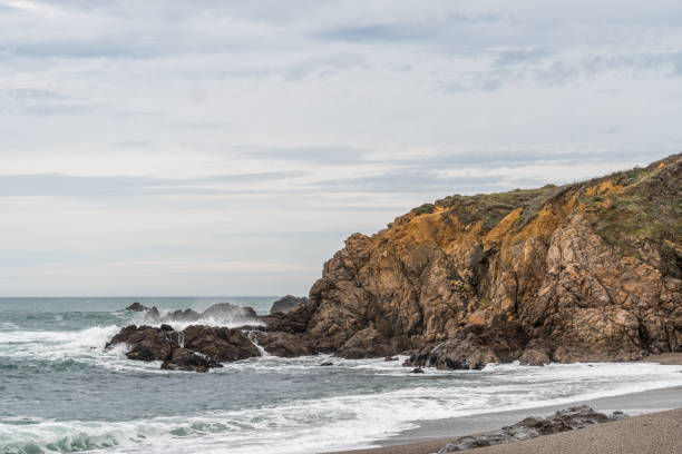 Rocky northern California coastline cliff and beach near Bodega Bay. stock photo