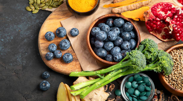 istock Healthy food clean eating selection on dark background. 1395657632