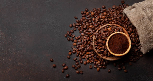 istock Roasted coffee beans in bag and ground coffee 1395663534