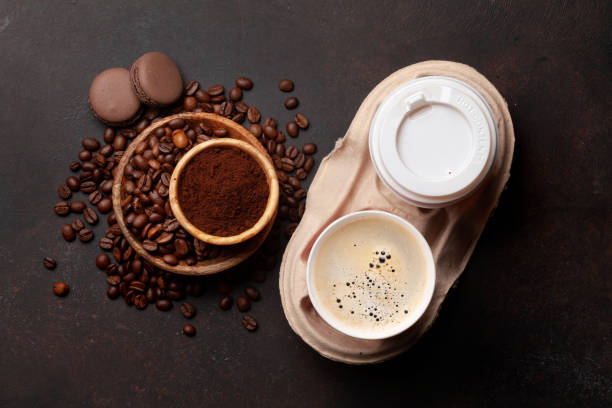 istock Takeaway cups, roasted coffee beans and ground coffee 1395663615
