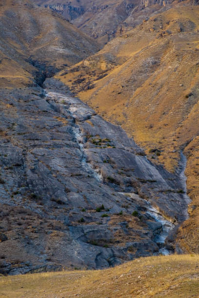 istock Rocky mountain dry riverbed 1395663996