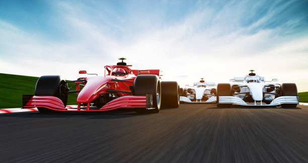 front view of fast moving generic red race car leading  group on a race track, motion blur,  3D, car of my own design.