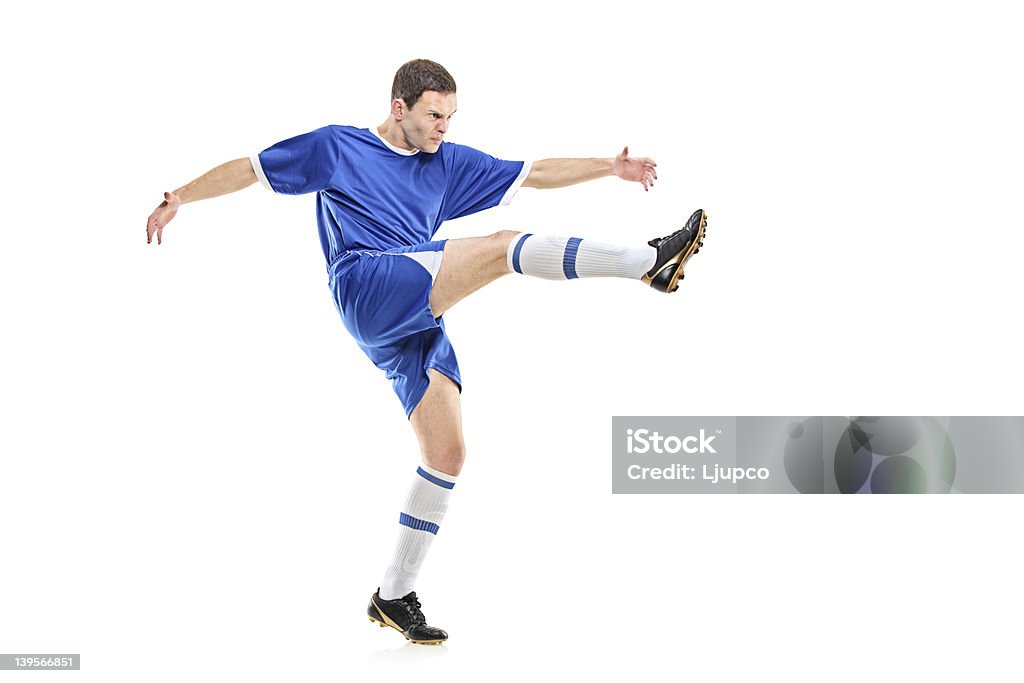 Soccer player shooting - Foto de stock de Azul libre de derechos