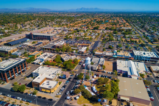 Gilbert, Arizona Aerial View Aerial View of the Phoenix suburb of Gilbert, AZ with Downtown Gilbert in the foreground and residential areas and mountains in the background. clear sky usa tree day stock pictures, royalty-free photos & images
