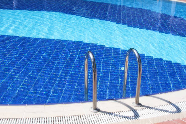 istock Swimming pool and stairs 1395670433