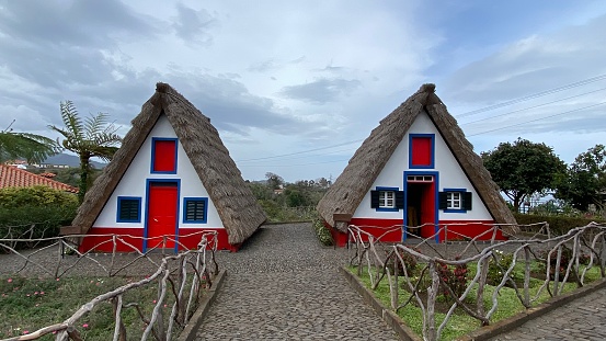 Santana, Portugal – January 17, 2021: Traditional thatched houses in the village of Santana, Madeira.