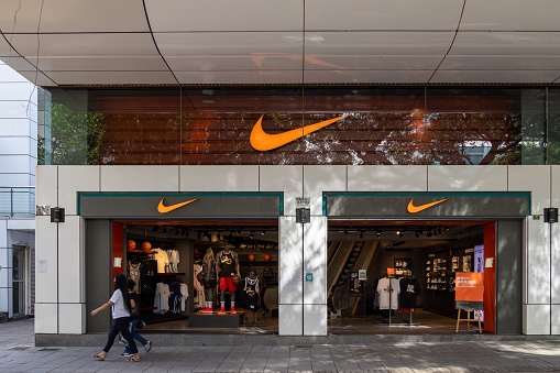 Hong Kong - May 5, 2022 : People walk past the Nike Store at Park Lane Shopper's Boulevard, Tsim Sha Tsui, Kowloon, Hong Kong.