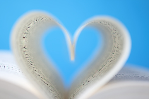 Love to reading books, pages folded into a heart shape
