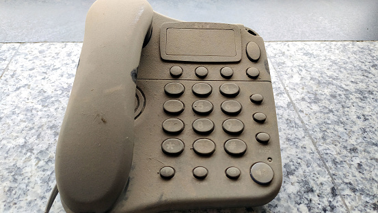 old landline telephone  equipment with huge dust