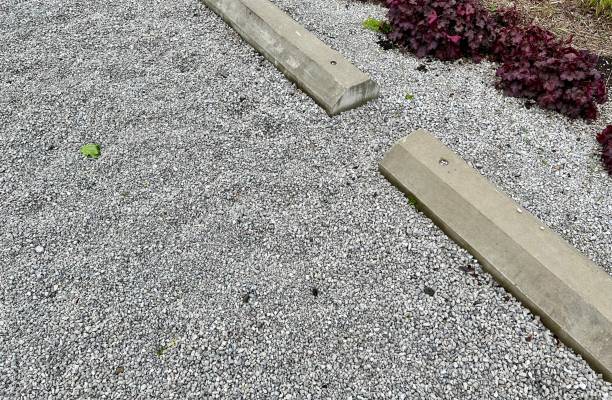 istock Gravel Parking Lot with Curbs 1395673233