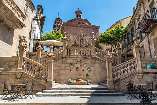 Barcelona, Spain. April 25, 2022. Vintage stairs in Spanish village (Poble Espanyol) museum open air in Barcelona. Spain. Traditional building in old town. Scenic landscape landmark.