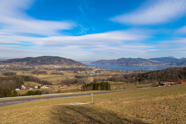 istock Panoramic view of die small village Abtsdorf and Attersee in Upper Austria. Image taken from Kronberg mountain. Tourism and vacations concept. 1395684949