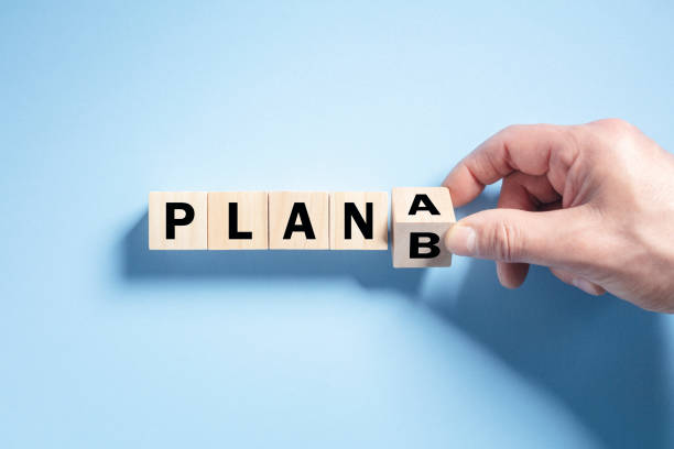 Change the wooden cube block word from Plan A to Plan B Change the wooden cube block word from Plan A to Plan B concept for strategy, change, alternative and perseverance safety net stock pictures, royalty-free photos & images