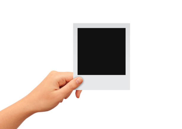 Hand holding blank instant photo card, design template