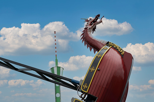 The pirate ship swings into the sky at Siam Park City.