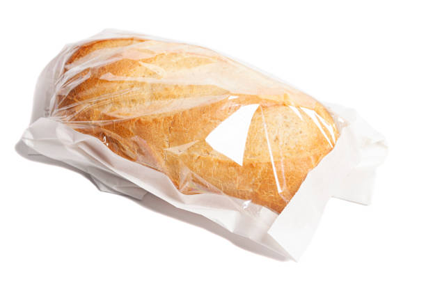 istock White bread in a paper bag isolated on white background 1395692306
