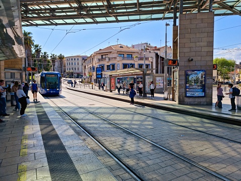 Corum (Montpellier) - Tram Station with a covering architectural feature. The image was captured during spring season.