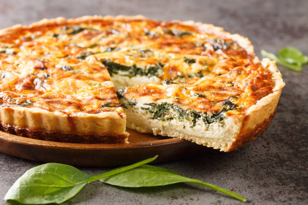 istock Florentine quiche with spinach and custard egg close-up. horizontal 1395693741
