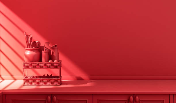 istock Stylized single color red kitchen counter and everyday utensils in morning sunlight. 1395694728