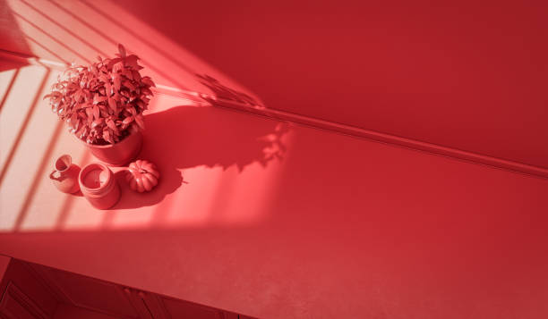 istock Stylized monochrome red countertop and everyday utensils in morning sunlight. 1395694750