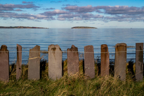 The coastal path that goes from Abergwyngregyn toward Llanfairfechan with its slate fences and mud/sand flats.