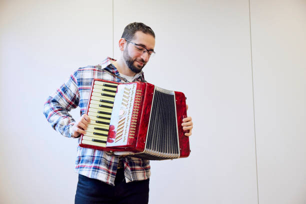 istock A man playing an accordion 1395696465