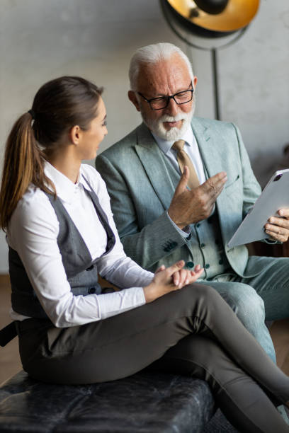 istock Senior businessman having a meeting with his apprentice 1395697105