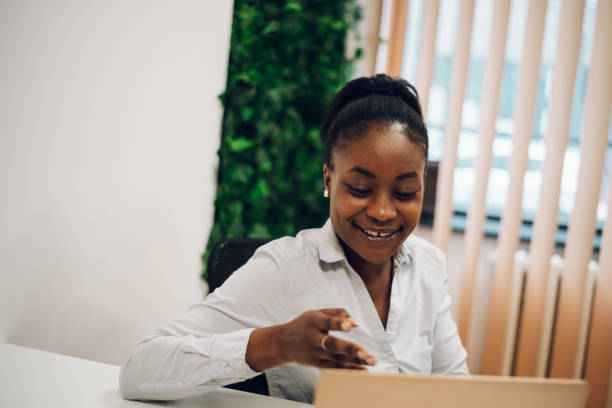 istock Business working on a laptop in a creative office environment 1395698587