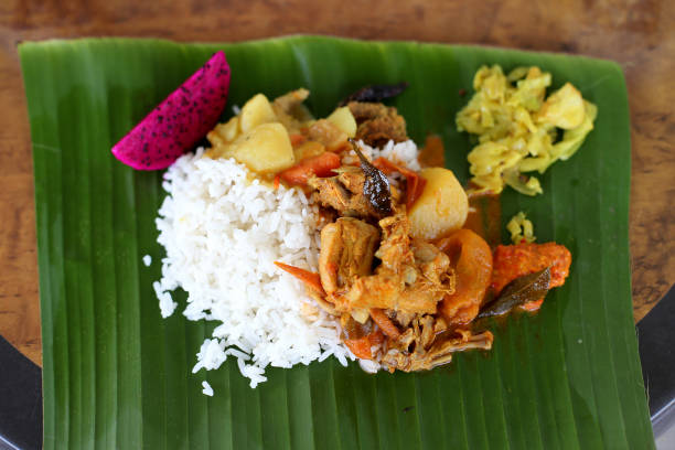 Banana leaf rice is a Malaysian local food.
