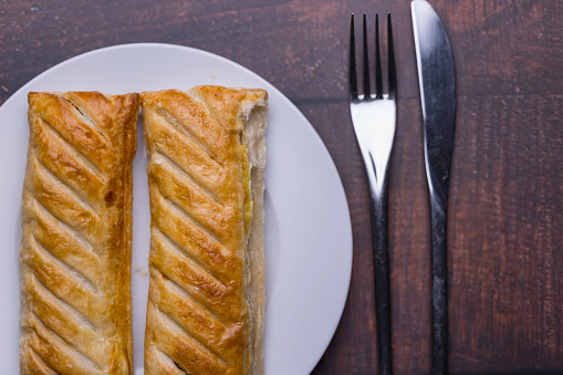 Perfectly-cooked sausage rolls waiting to be eaten.